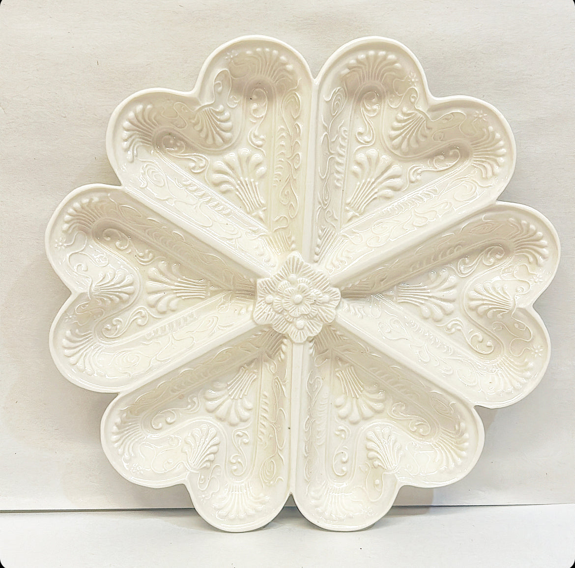 Vintage signed Metropolitan Museum of Art cream ware pottery plate dish.