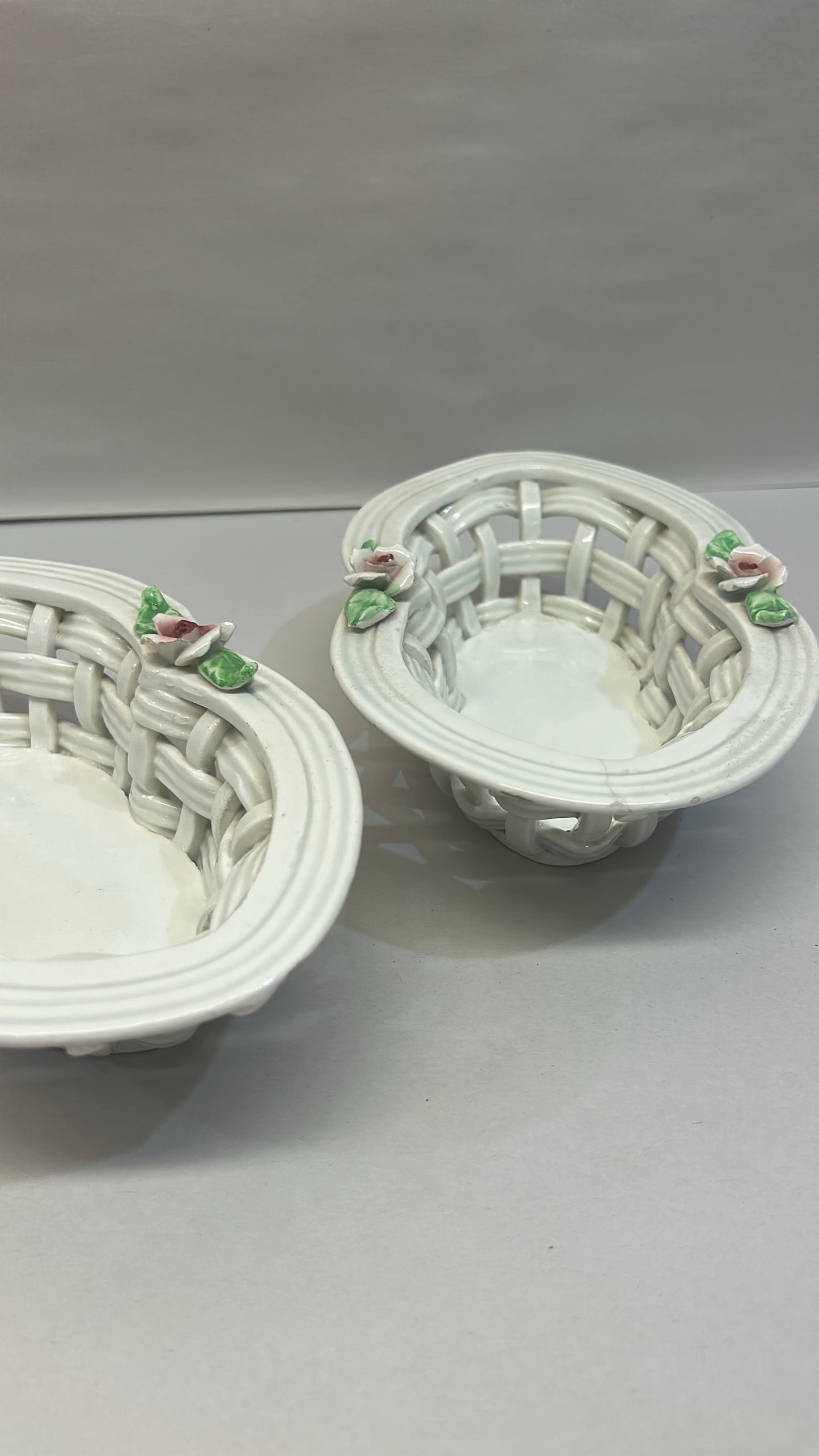 Rare matching pair of vintage 60s oval style shaped white ceramic baskets