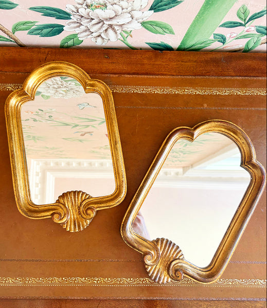 Pair of vintage Italian Florentine style shell wooden carved mirrors.