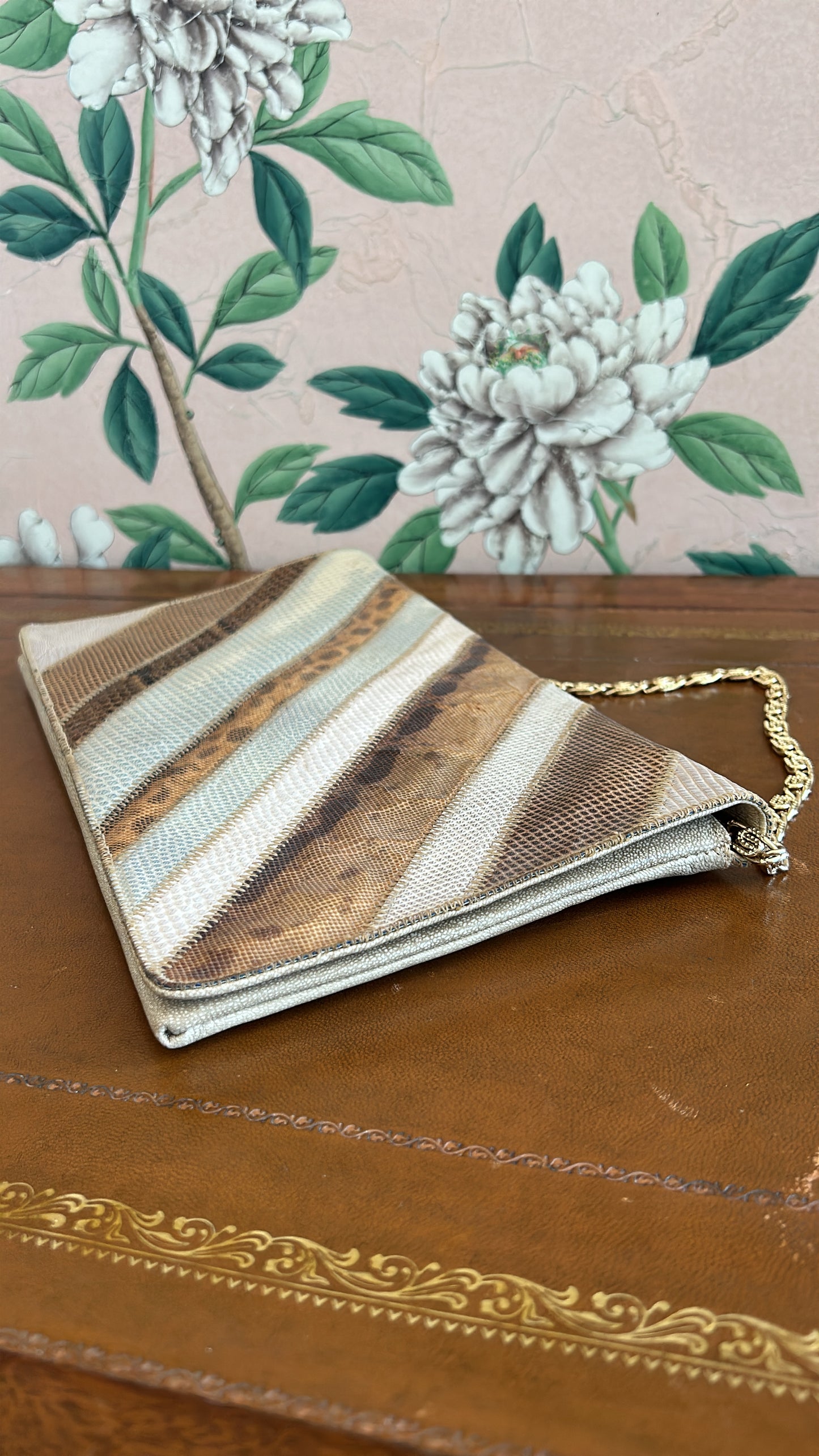 Vintage 1970s snake sink clutch purse with gold chain.