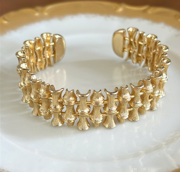 1970s vintage faux bamboo gold cuff bracelet.