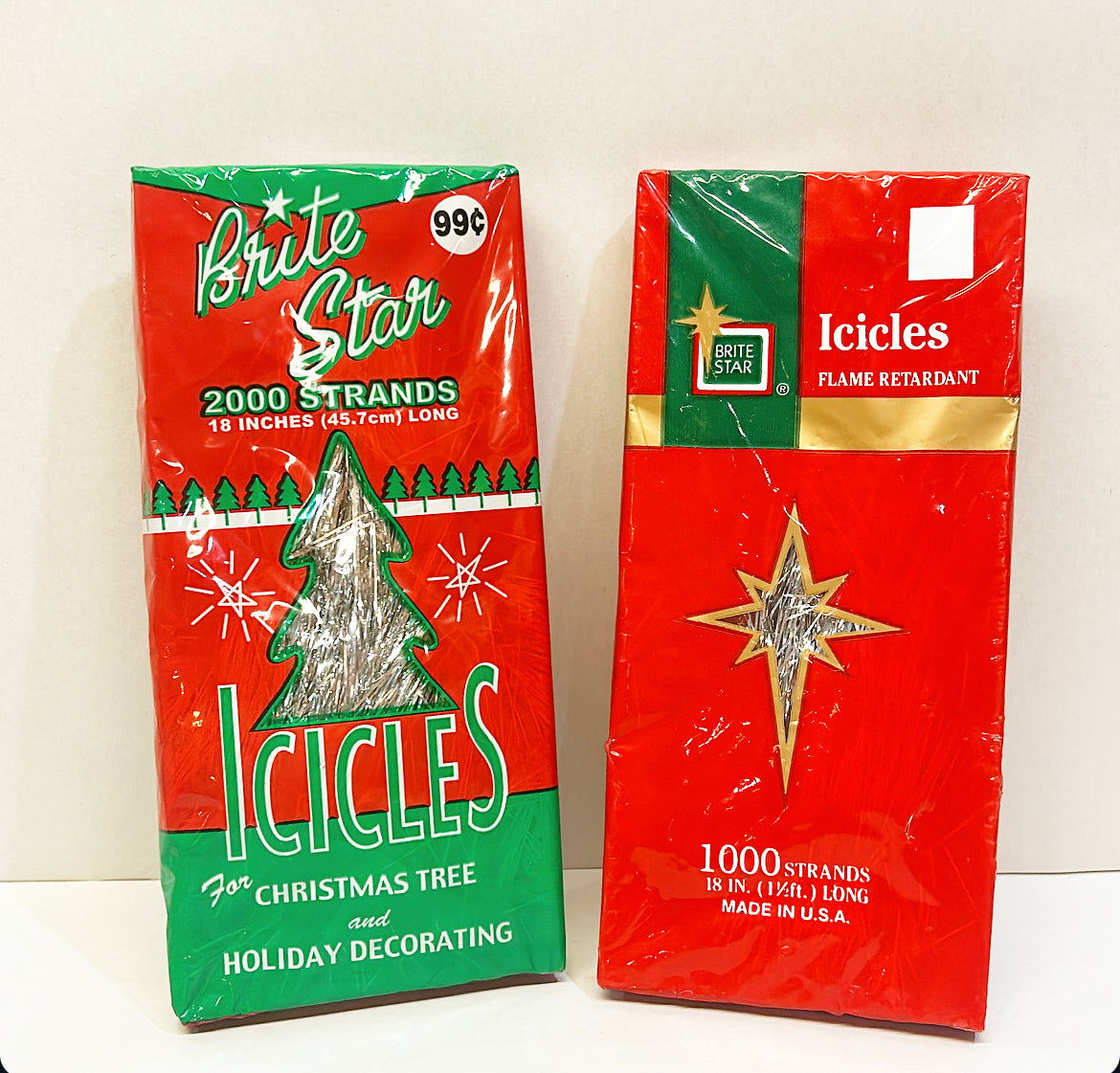 Vintage set of 2 Christmas tree boxes of silver icicles.