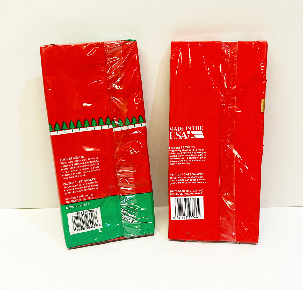 Vintage set of 2 Christmas tree boxes of silver icicles.