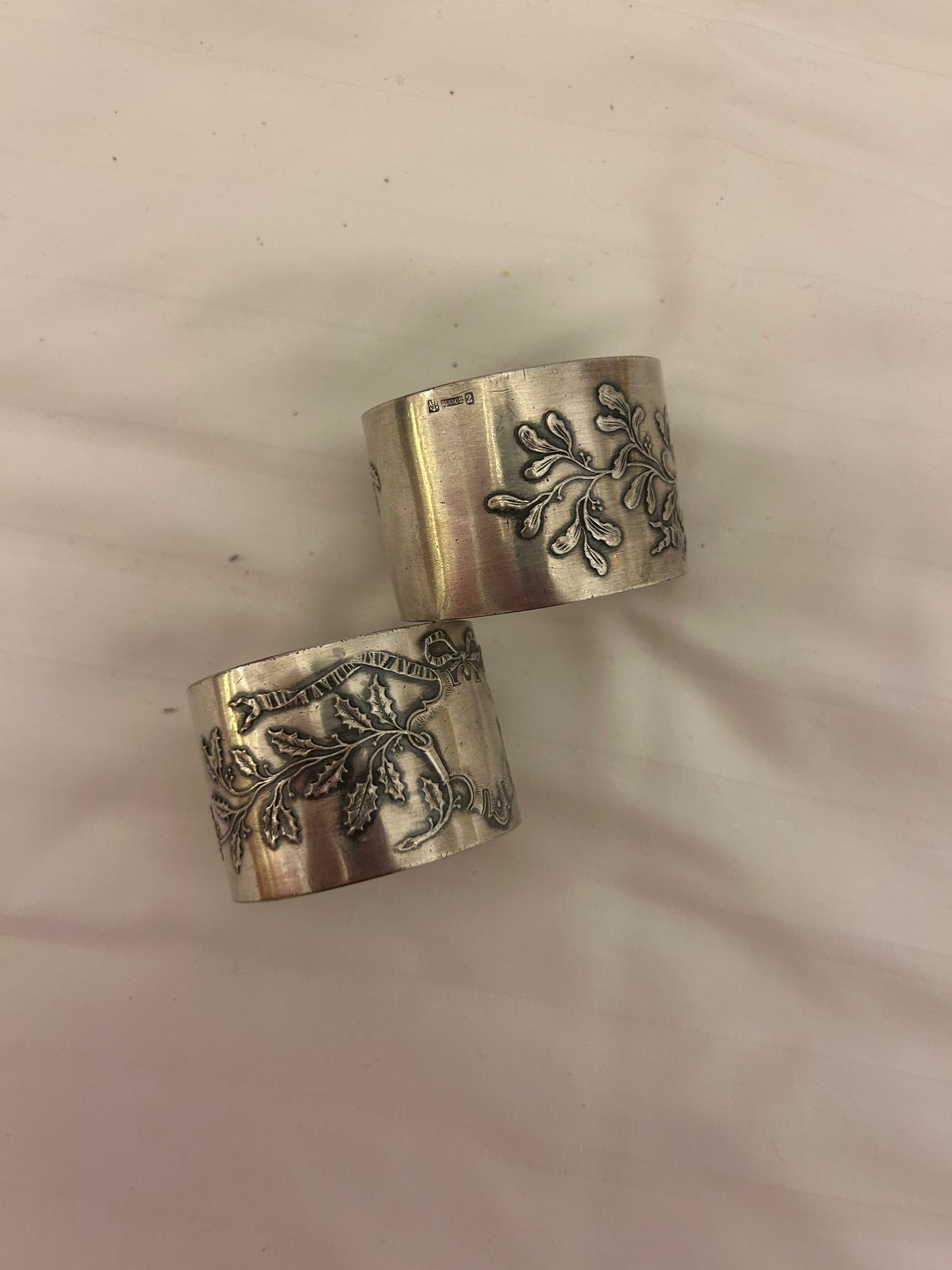 Pair of antique French sterling silver napkin rings