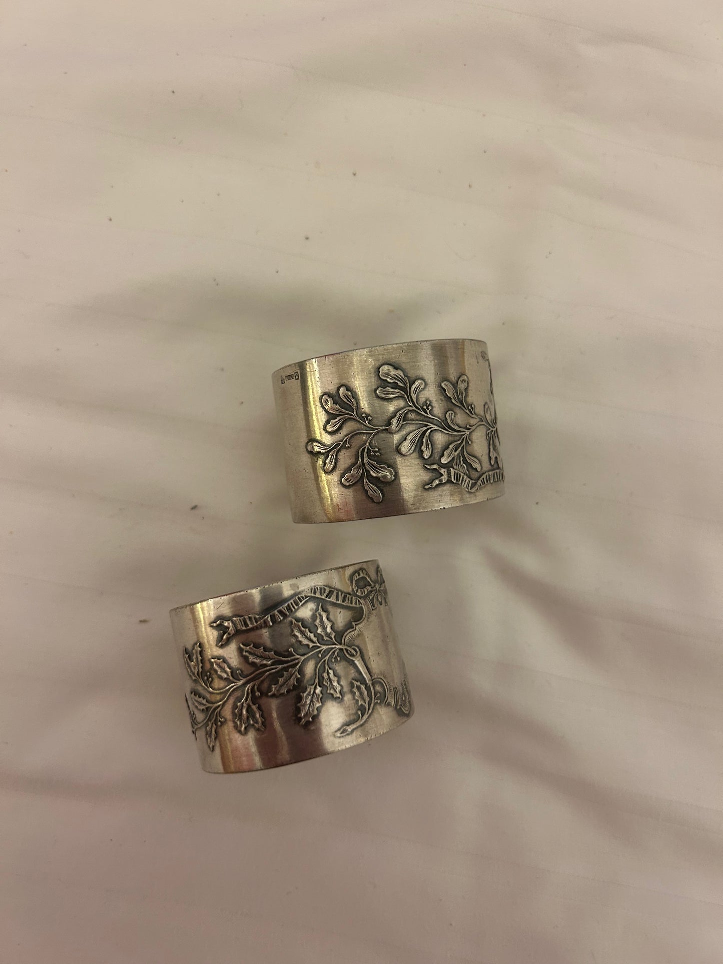 Pair of antique French sterling silver napkin rings