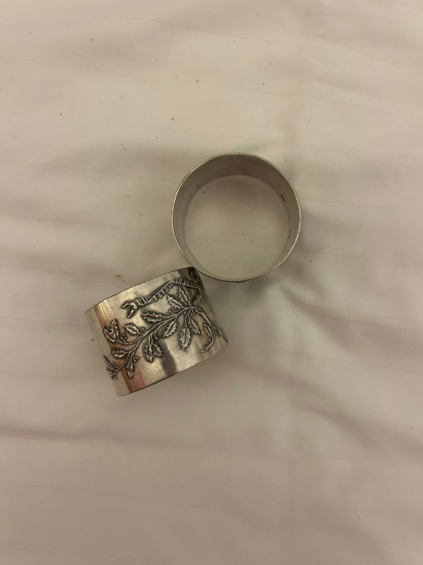 Pair of antique French sterling silver napkin rings