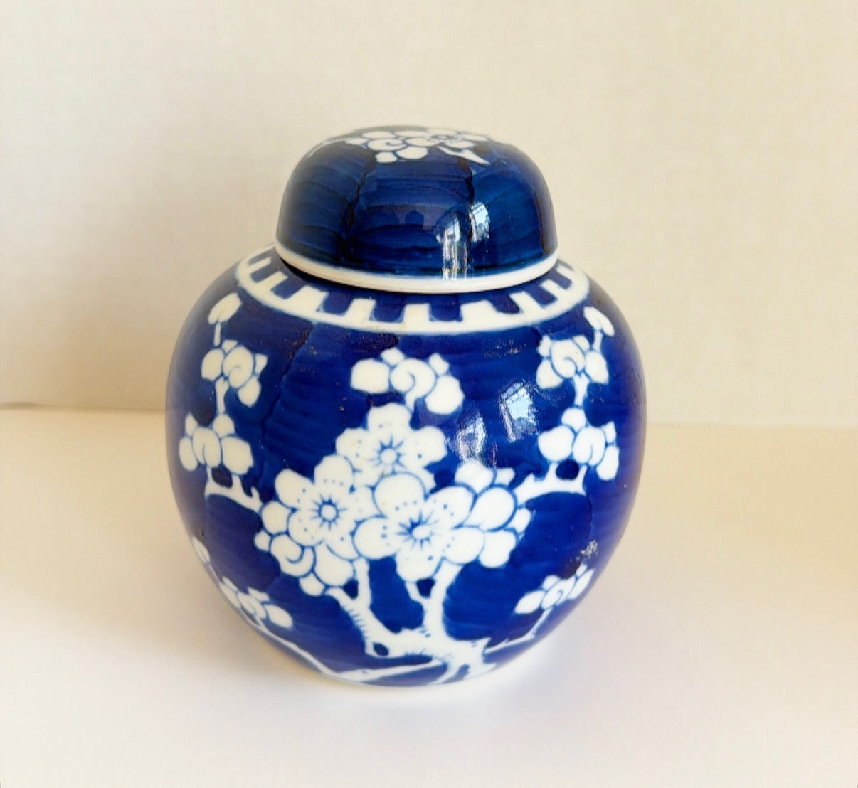 Smaller scale, blue and white cherry blossom ginger jar with top.