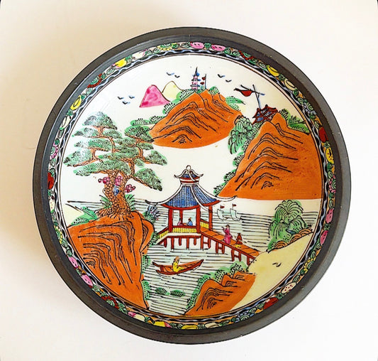 Vintage Asian style decorative bowl with pagoda scene