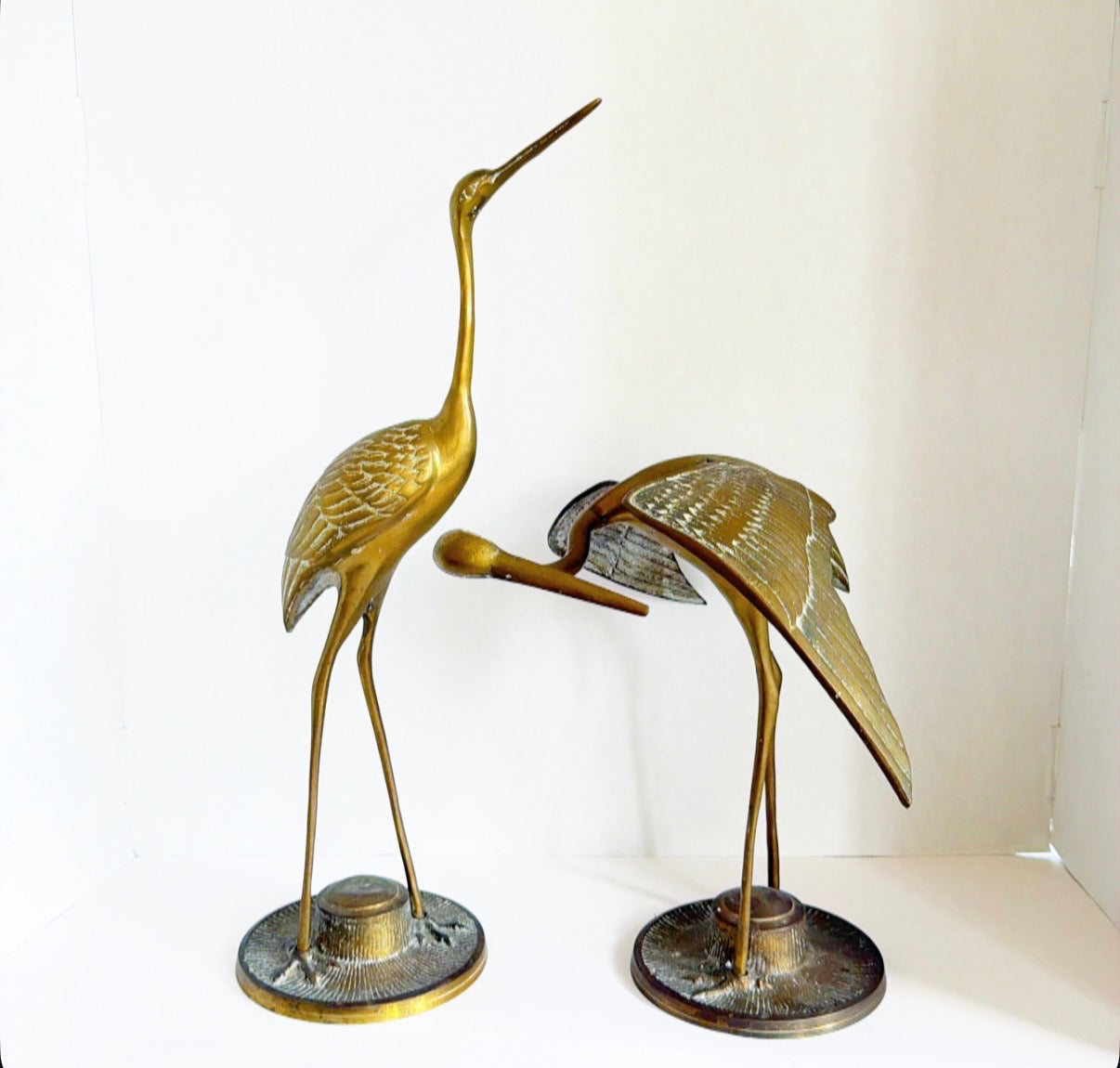 Pair of solid brass cranes