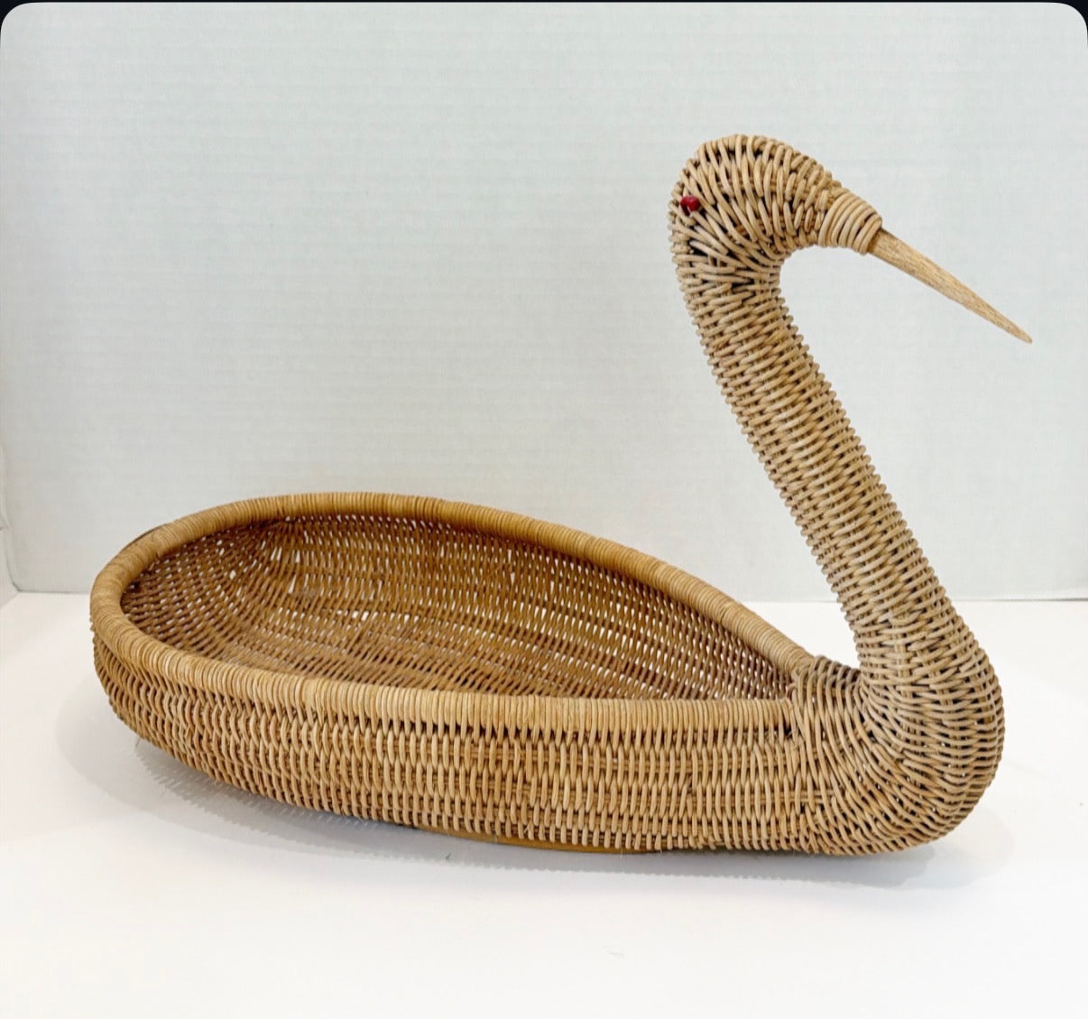 1970s natural wicker swan basket.&nbsp;
