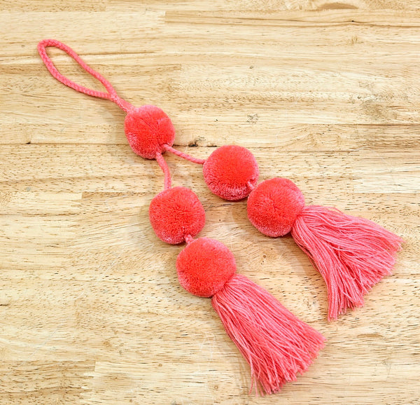 Hand made coral pink triple ball tassel.