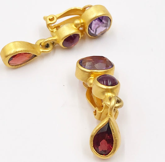 Tiny designer signed high quality clip on earrings.