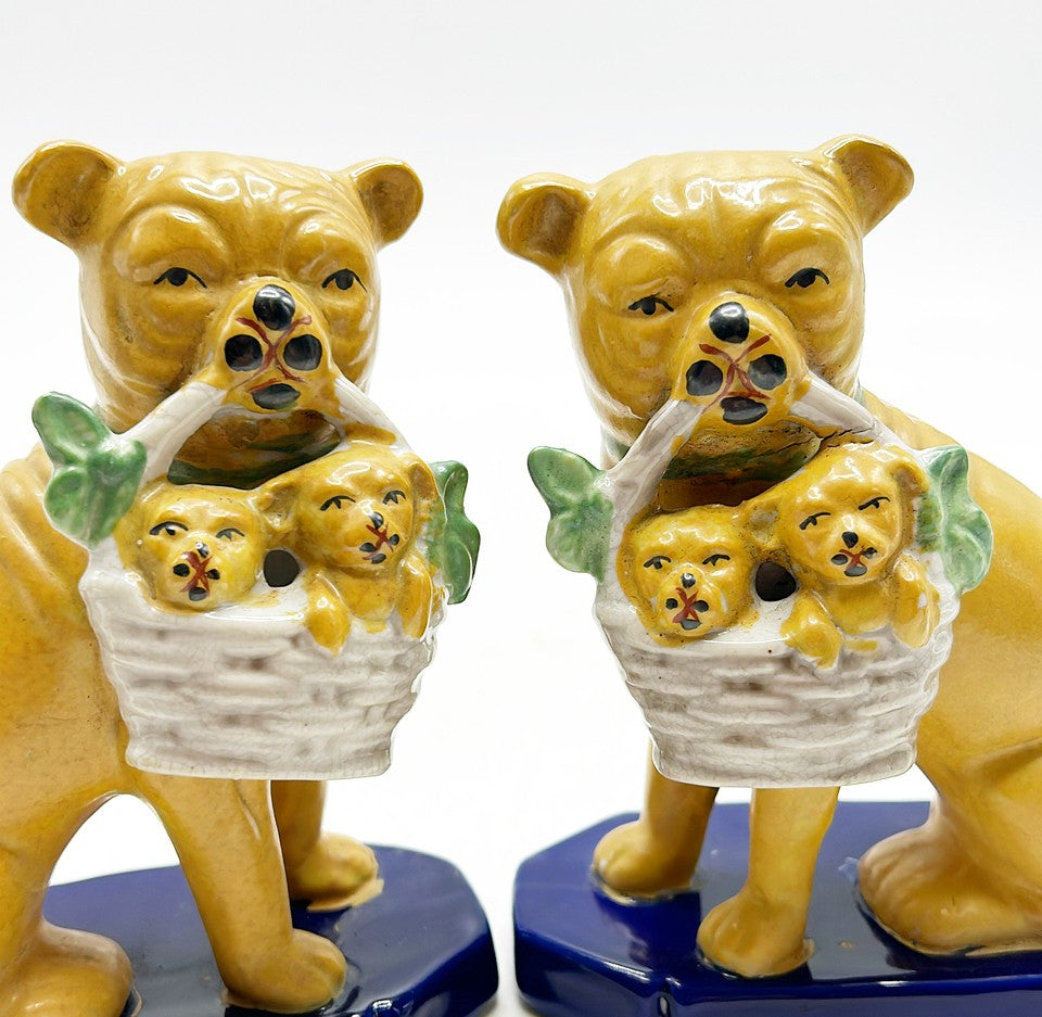 Antique pair of pug Staffordshire style pug dogs.